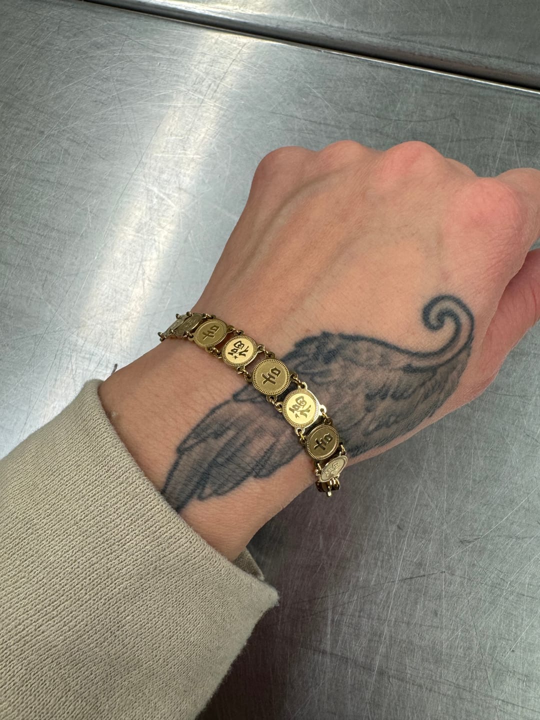 Customer photo review of Lucky Coin Bracelet