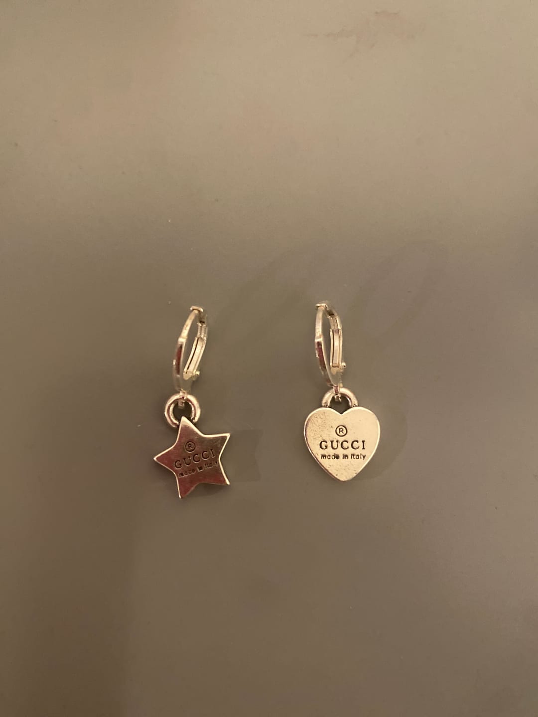 Customer photo review of Luxe Huggie Hoop Charm Earrings