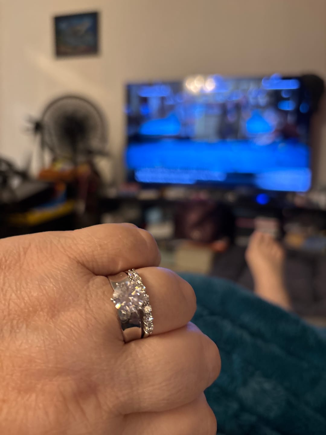 Customer photo review of Solitaire Round Moissanite Concave Wide Band Engagement Ring