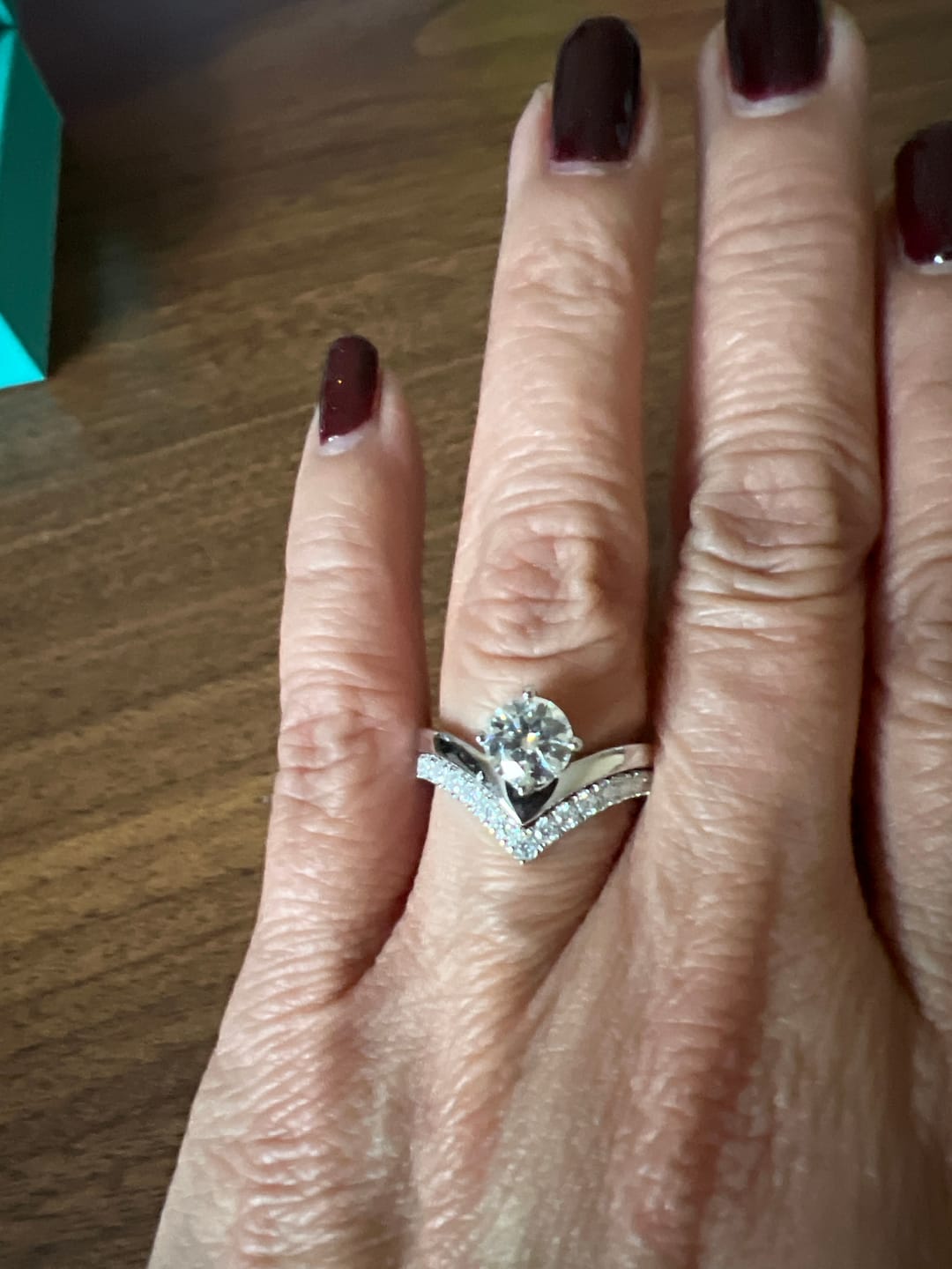 Customer photo review of Solitaire Chevron Round Moissanite Bridal Set Engagement Ring