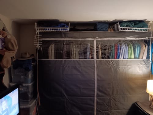 Customer photo review of Raybee 90.6''W Heavy Duty Clothes Rack with Cover,1200lbs Freestanding Garment Rack for Bedroom