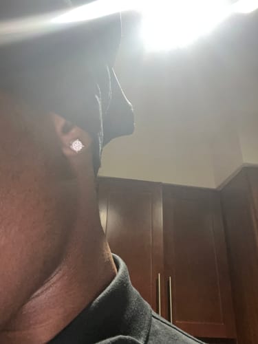 Customer photo review of 3D Pave Stud VVS Moissanite Earrings .925 Sterling Silver