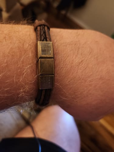 Customer photo review of Deal 33% Off ! Don't Tread On Me Leather Bracelet: Helps Pair Veterans With A Service Dog or Shelter Dog