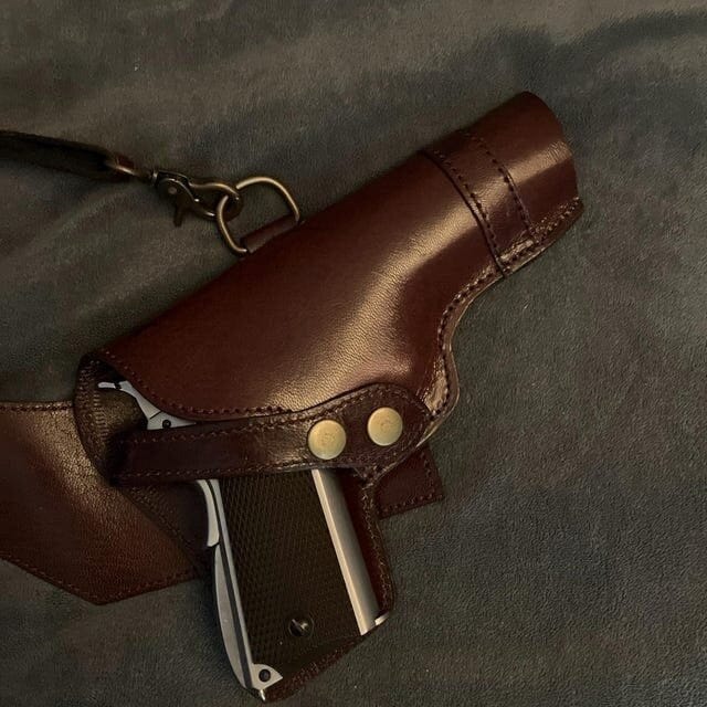 Customer photo review of Cowhide Leather Vertical Concealed Holster Right and Left Handers Universal Size
