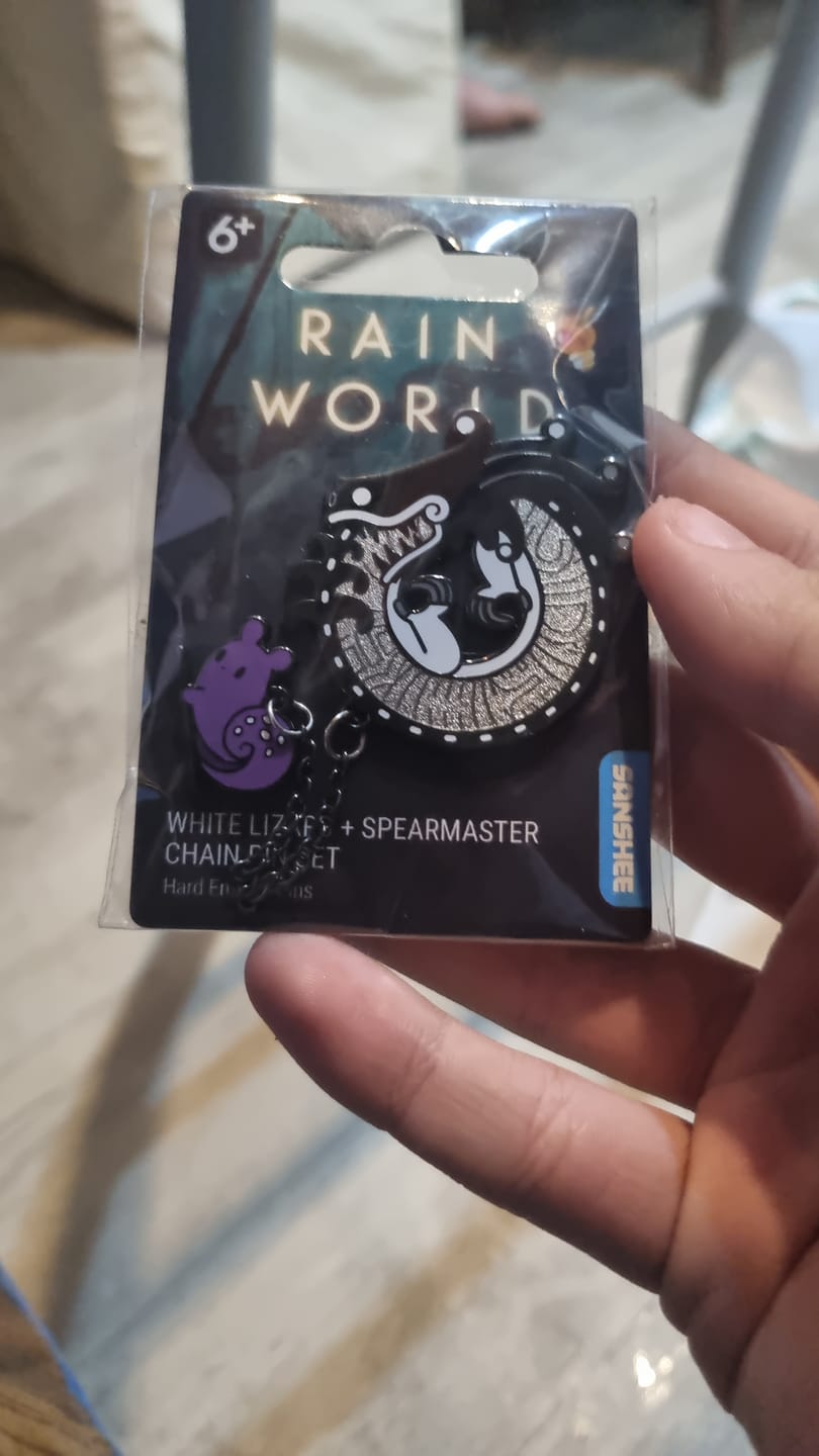 Customer photo review of Rain World - White Lizard Hanger Pin