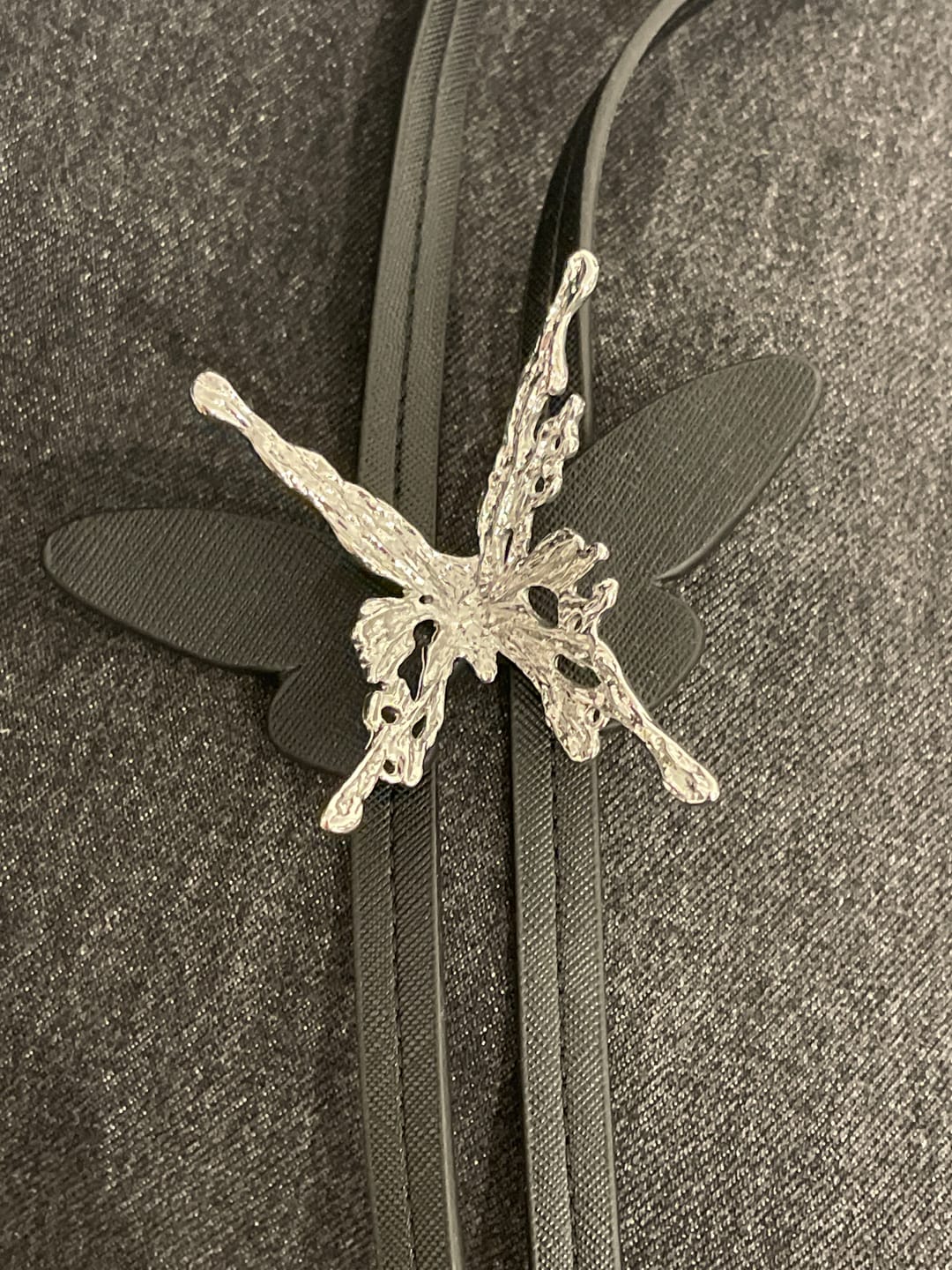 Customer photo review of "ButterflyWasteland" Platinum Plated Gothic Butterfly Bolo Tie Necklace, Adjustable Lariat Choker