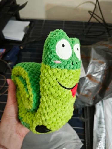 Customer photo review of Dog Puzzle Feeder Interactive Toy Indestructible Plush Sound Squeak Puppy Toys For Resistant Foldable Snail Dogs Pet Supplies