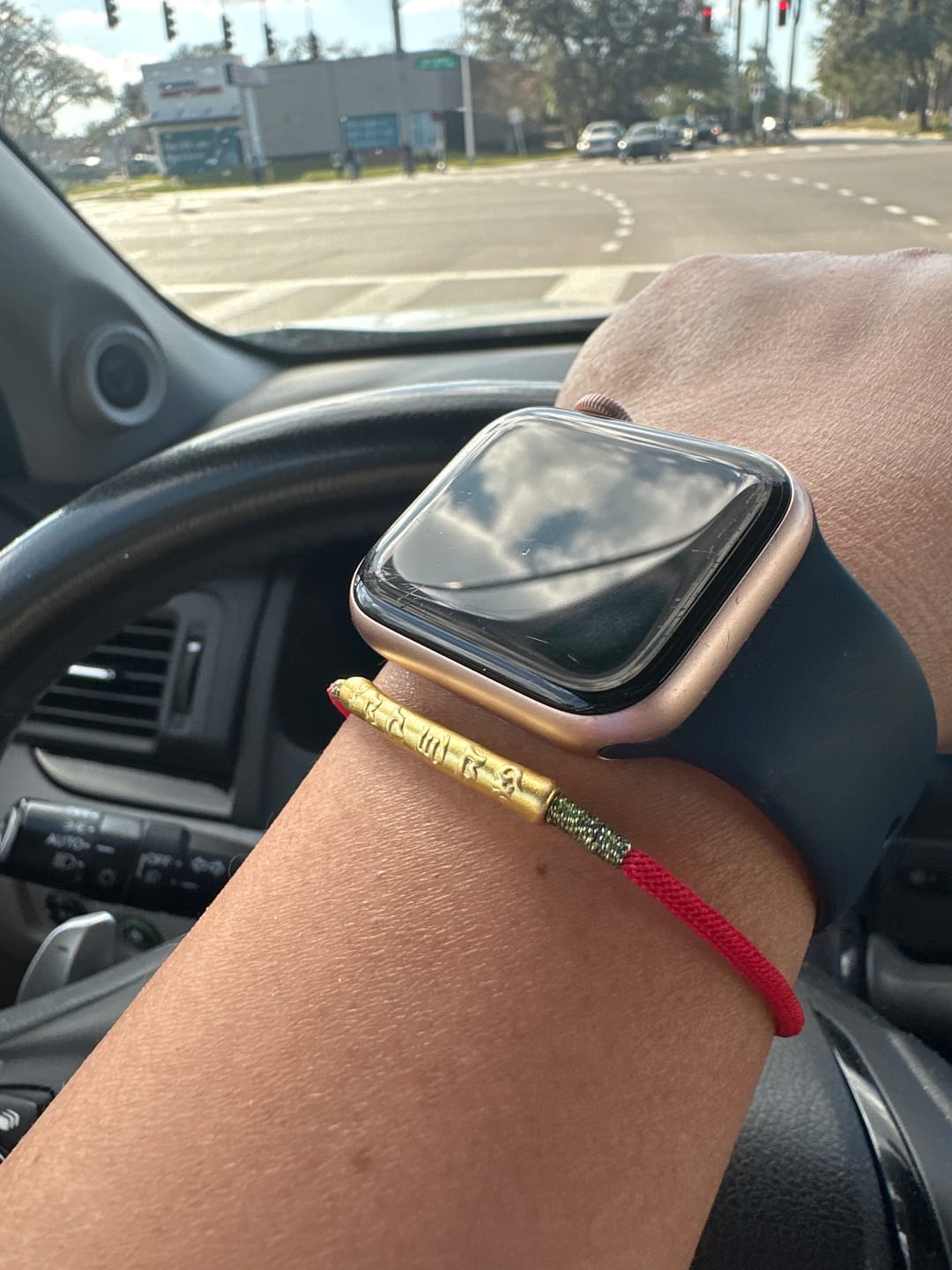 Customer photo review of Handmade 99 Silver Mantra Tibetan Buddhist Red String Bracelet - Protection & Good Luck