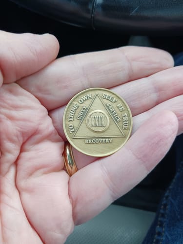 Customer photo review of Recovery Mint 29 Year Bronze AA Meeting Chips - Twenty-Nine Year Sobriety Coins/Tokens