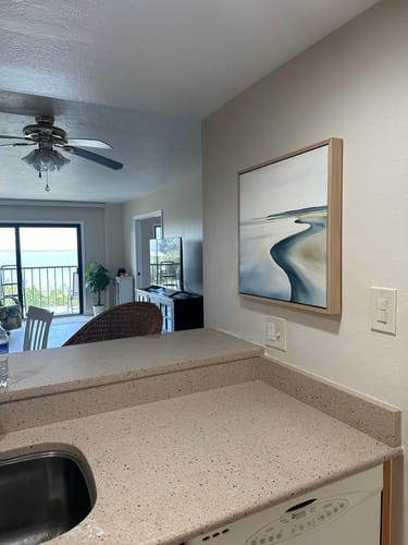 Customer photo review of Serene Coastline Canvas Art
