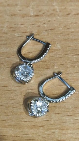 Customer photo review of Sterling Silver Huggie Hoop Earrings 2Ct Moissanite Center Stone — Silver | KIMLUD