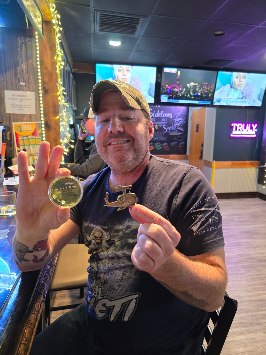 Customer photo review of God Bless Our Troops Thank You Coin