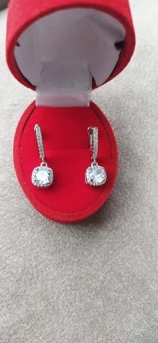 Customer photo review of Sterling Silver Huggie Hoop Earrings 2Ct Moissanite Center Stone — Silver | KIMLUD