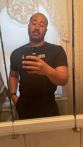 Customer photo review of Jesus is King Performance Tee