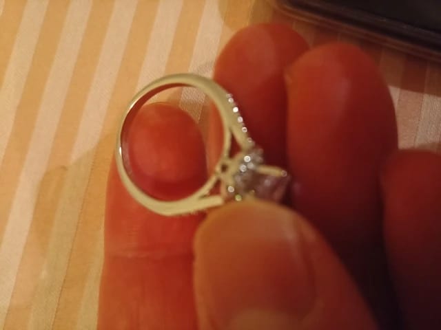 Customer photo review of Sterling Silver Huggie Hoop Earrings 2Ct Moissanite Center Stone — Silver | KIMLUD