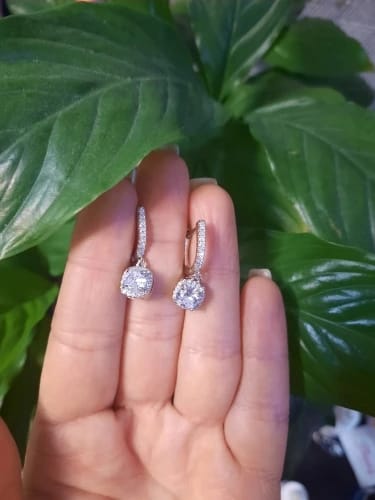 Customer photo review of Sterling Silver Huggie Hoop Earrings 2Ct Moissanite Center Stone — Silver | KIMLUD