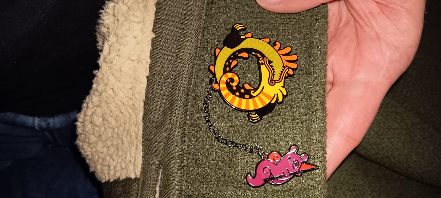 Customer photo review of Rain World - Yellow Lizard Hanger Pin