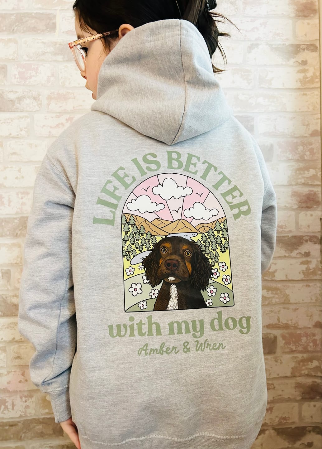 Customer photo review of Personalised Kids Life is Better with your dog Hoody