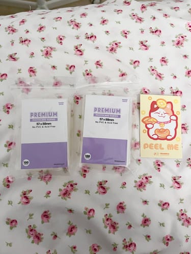 Customer photo review of PREMIUM PHOTOCARD SLEEVES - PURPLE VERSION (57x88MM)