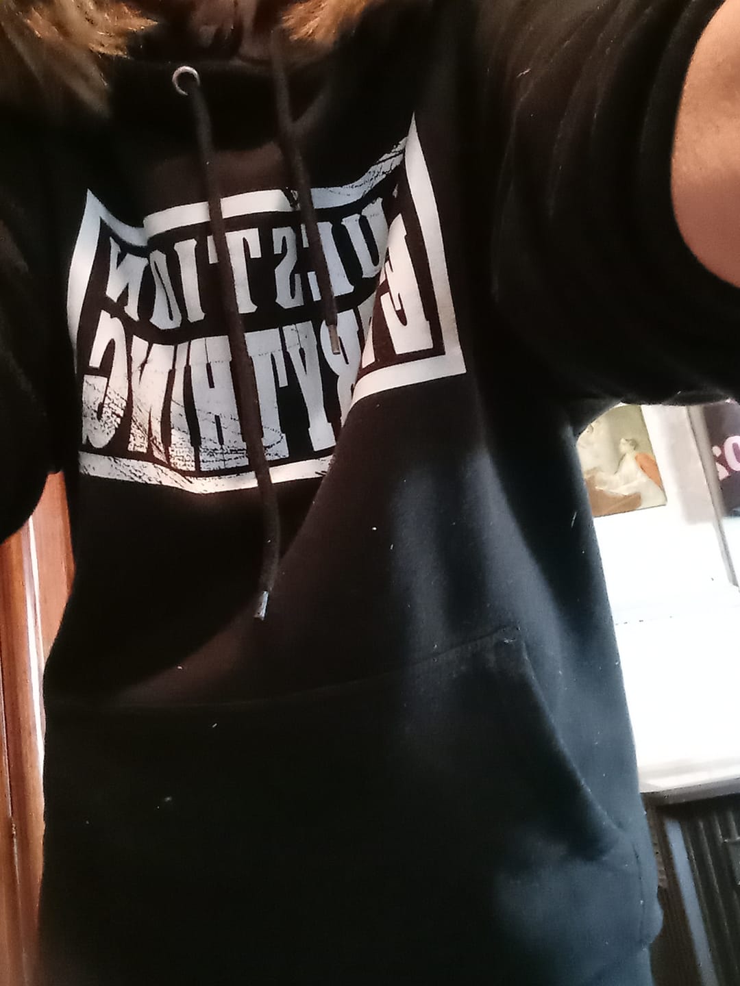 Customer photo review of Question Everything Hoodie