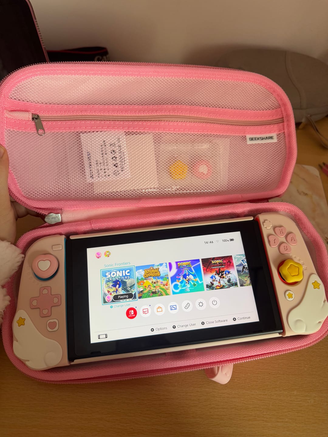 Customer photo review of GeekShare Cream Heart Thumb Grips