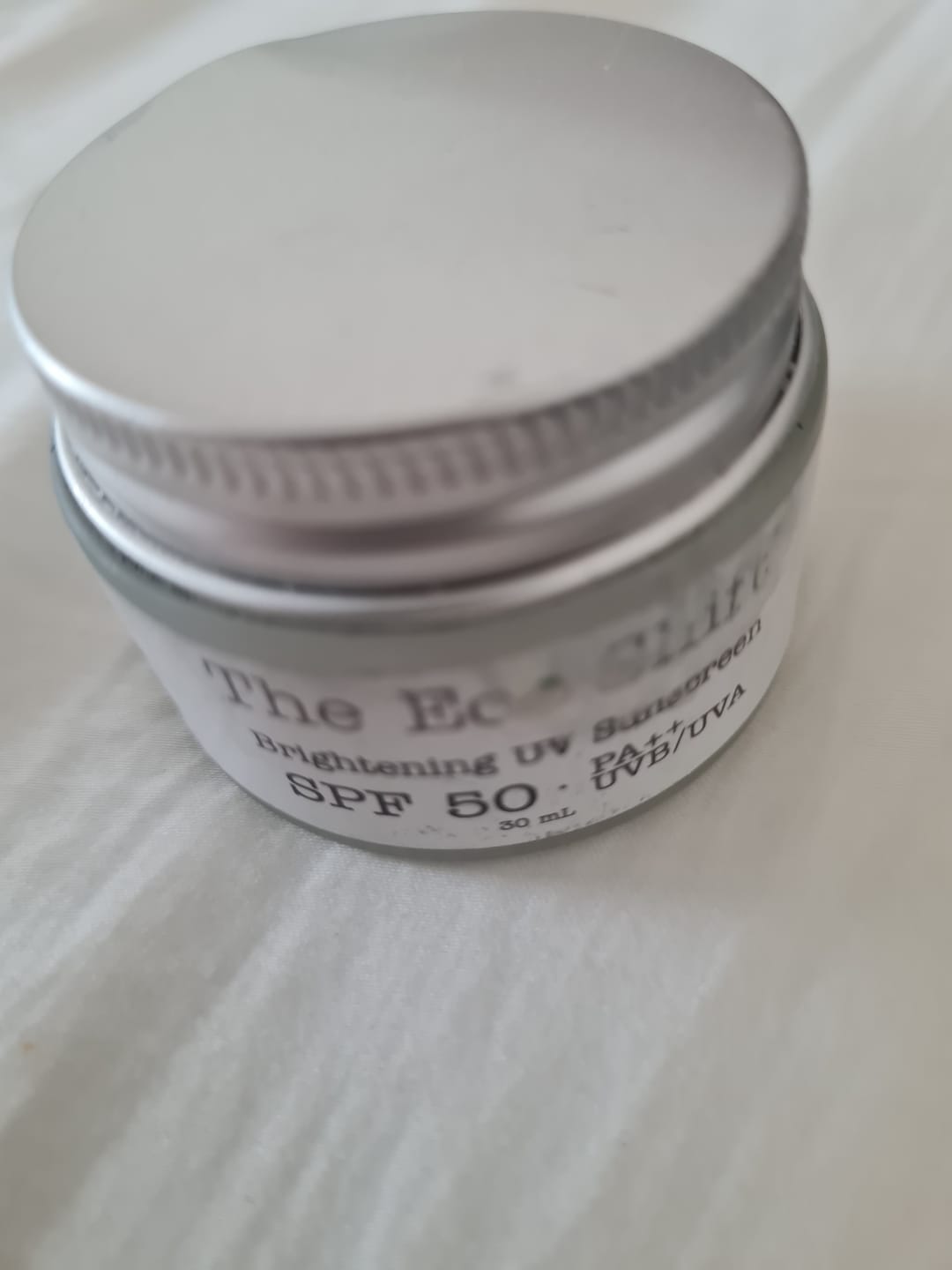 Customer photo review of Brightening UV Sunscreen & Skin Primer with SPF 50