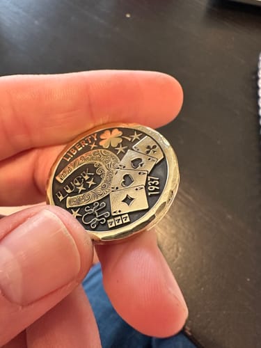 Customer photo review of Golf Ball  Marker Hobo Luck