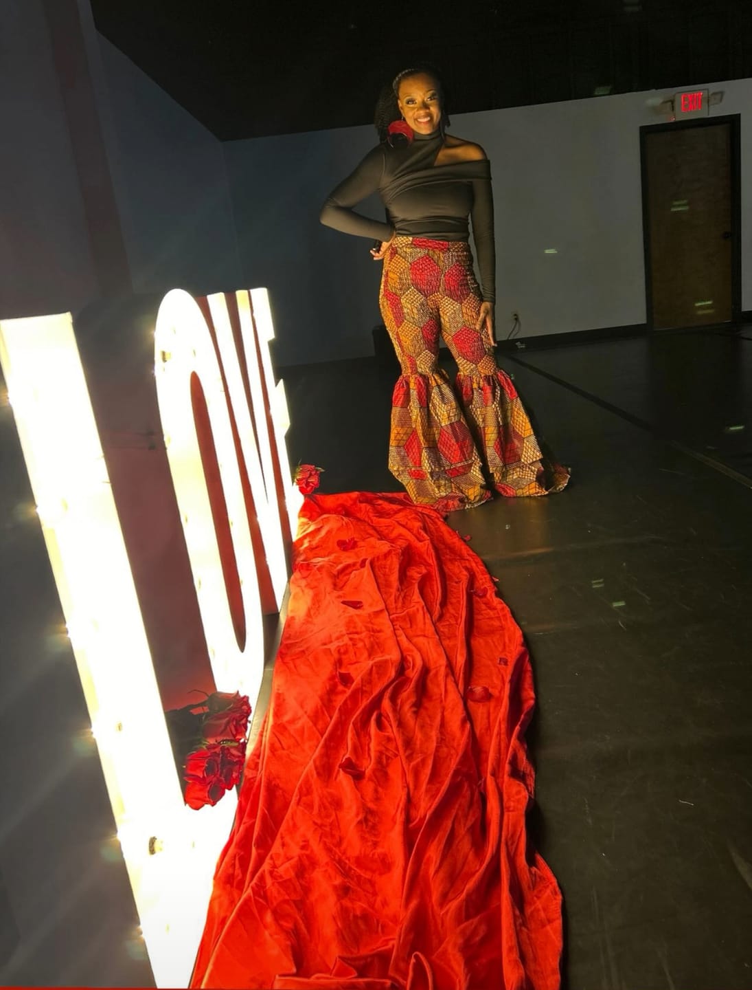 Customer photo review of Kimi Women's African Print Bell Bottom Pants - Pink