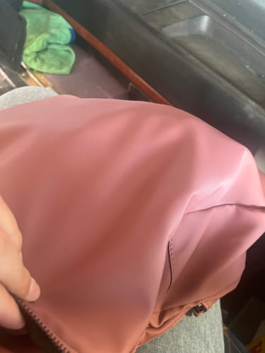 Reseña con foto de un cliente sobre Mochila Textura