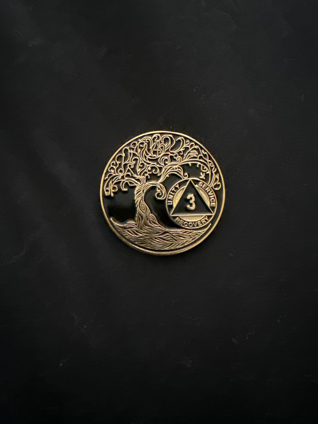 Customer photo review of 1 to 65 Year Sobriety Mint Twisted Tree of Life Gold Plated AA Recovery Medallion/Chip/Coin - Black