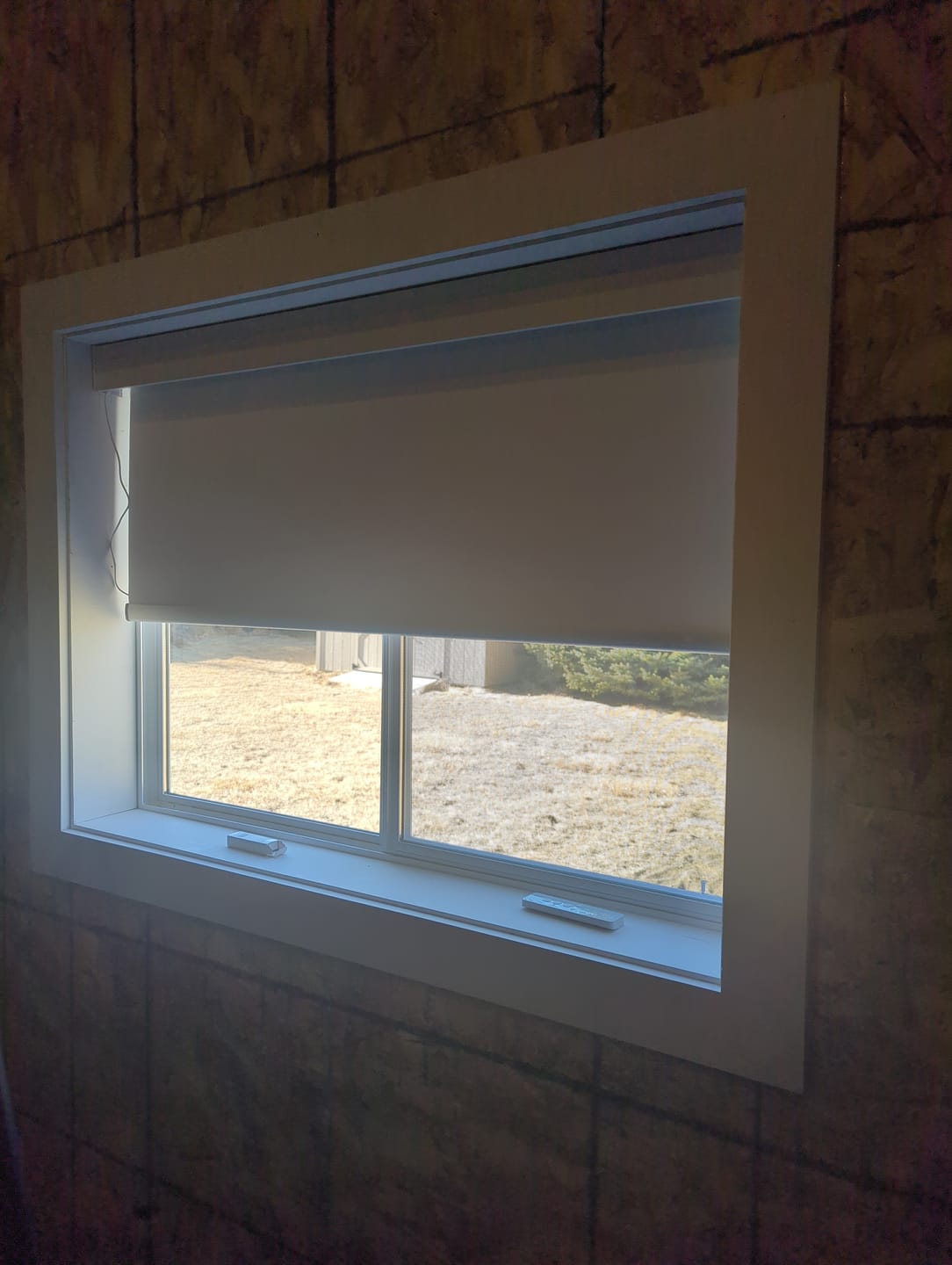 Customer photo review of SmartWings Motorized Roller Shades 100% Blackout Essential