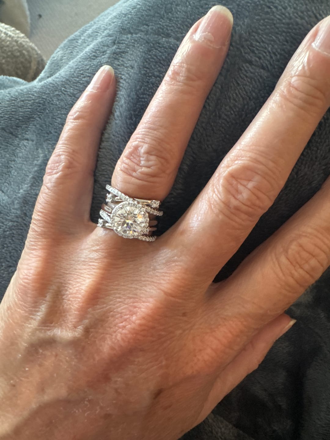 Customer photo review of Halo Moissanite With Enhancer Cross Shank Bridal Engagement Ring Set