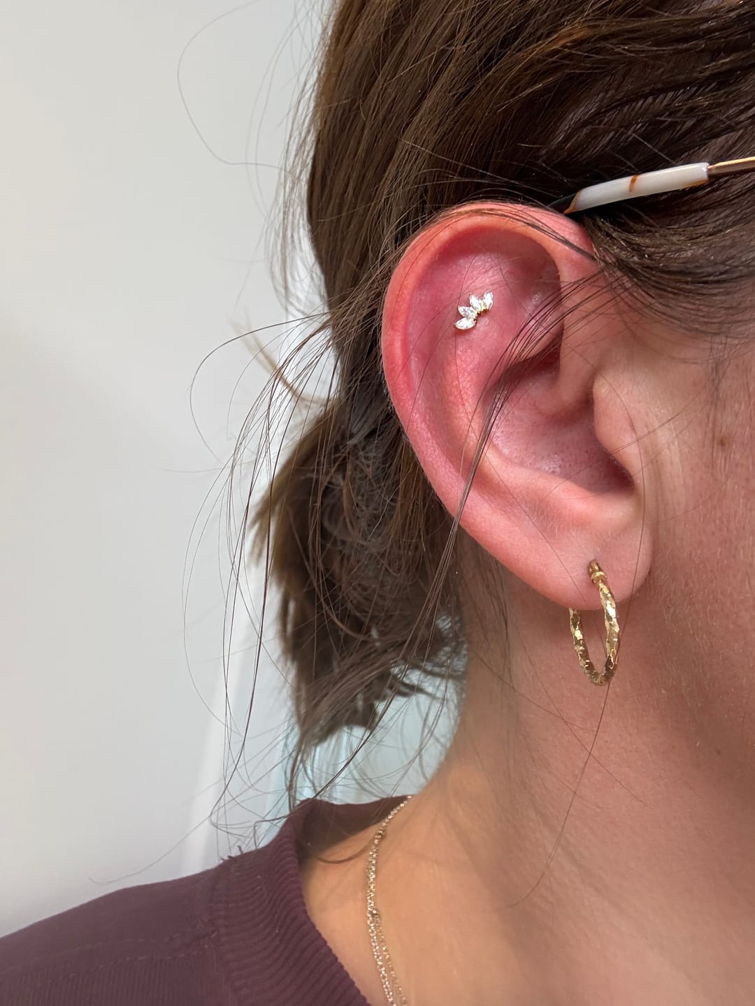 Customer photo review of Magic Lotus Labret Piercing - Titan