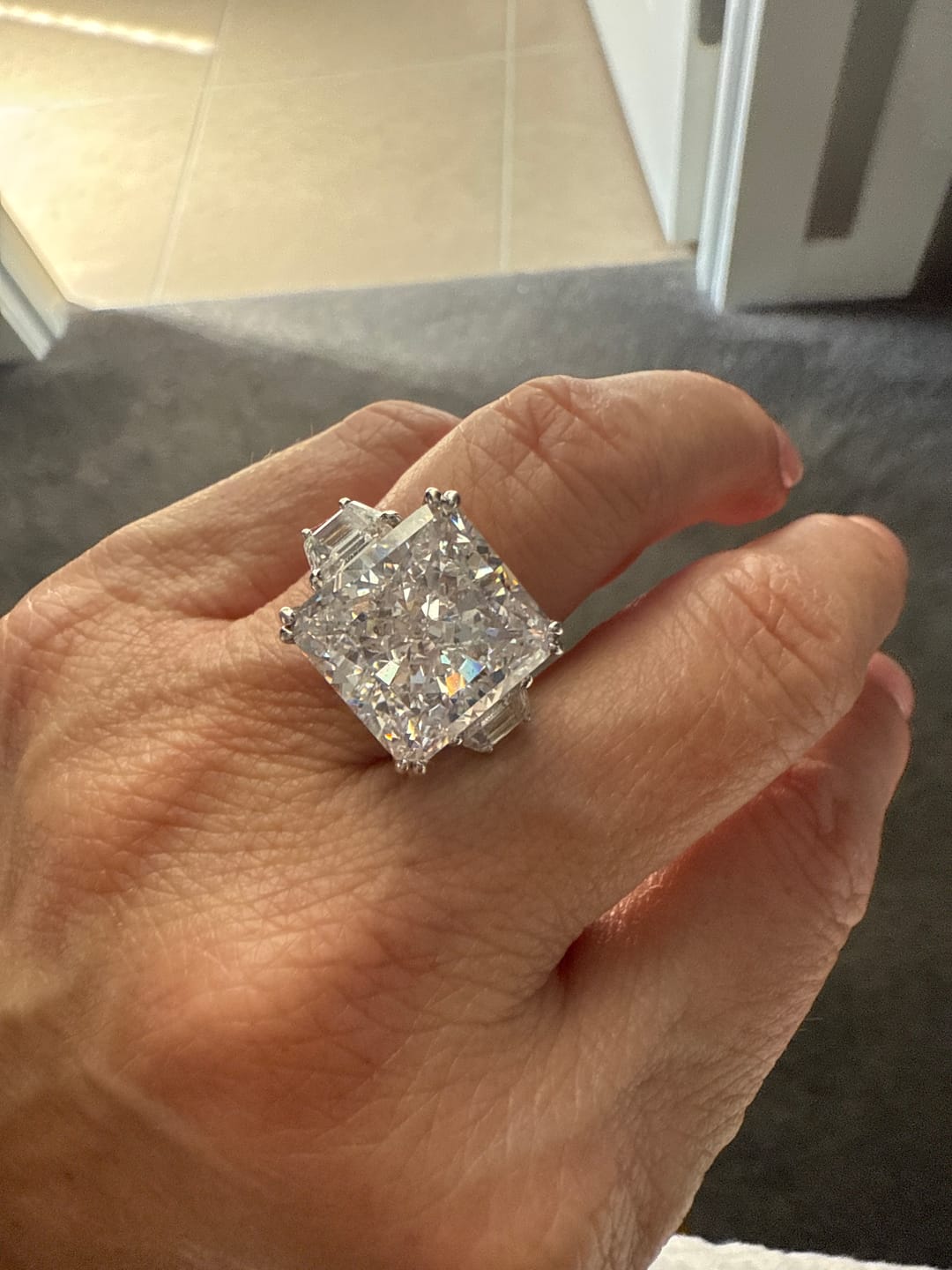 Customer photo review of S925 6.5/12.0 Ct Radiant Cut Crushed Ice Simulated Diamond Three-Stone Engagement Travel Ring