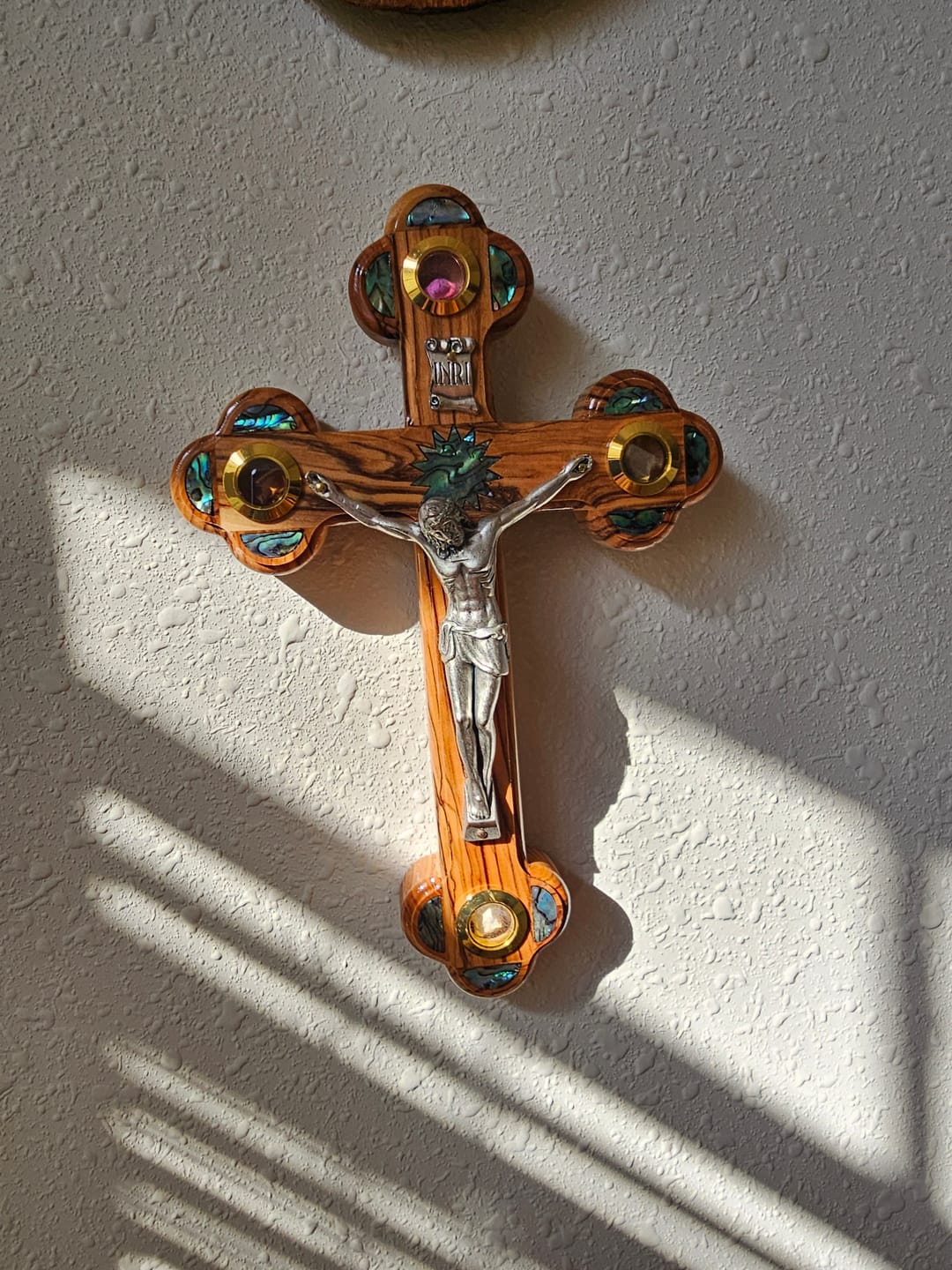 Customer photo review of Olive Wood Crucifix (Partially covered with Mother of Pearl) - Holy Land Crucifixes