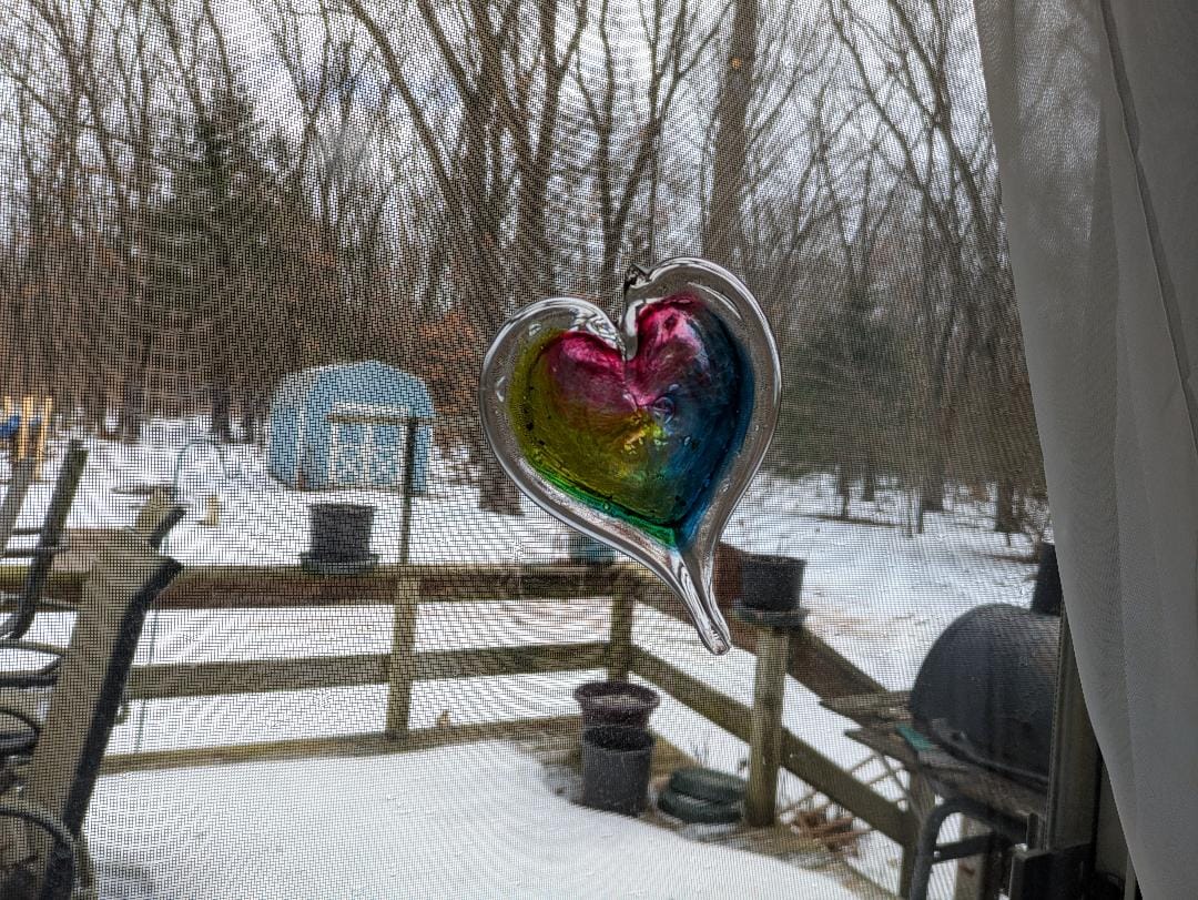 Customer photo review of Rainbow Sky Pendant with Infused Cremation Ashes