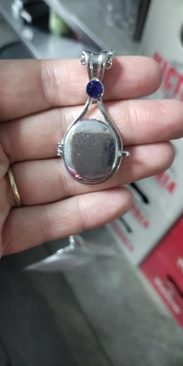 Customer photo review of H2O Just Add Water Mermaid Locket Necklace