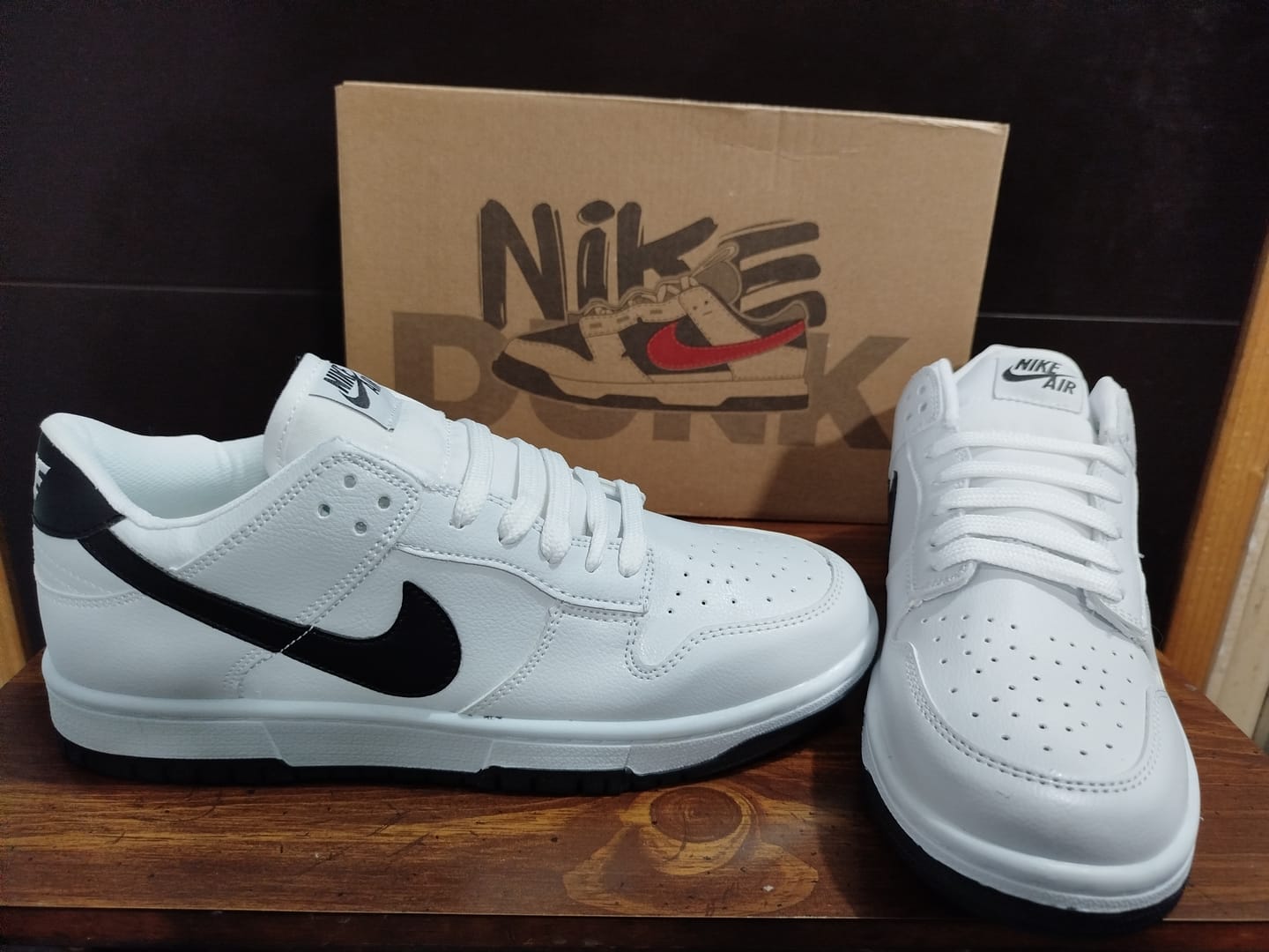 Customer photo review of Tenis Dunk Blanco Negro