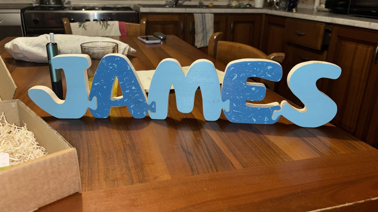 Customer photo review of LETTERE INCASTRINE - nome con lettere ad incastro stile puzzle
