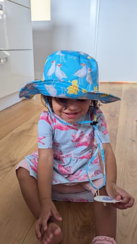 Customer photo review of Mermaid and Dolphin Beach Hat