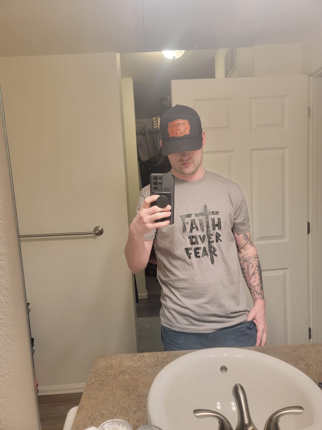 Customer photo review of Faith Over Fear Tee