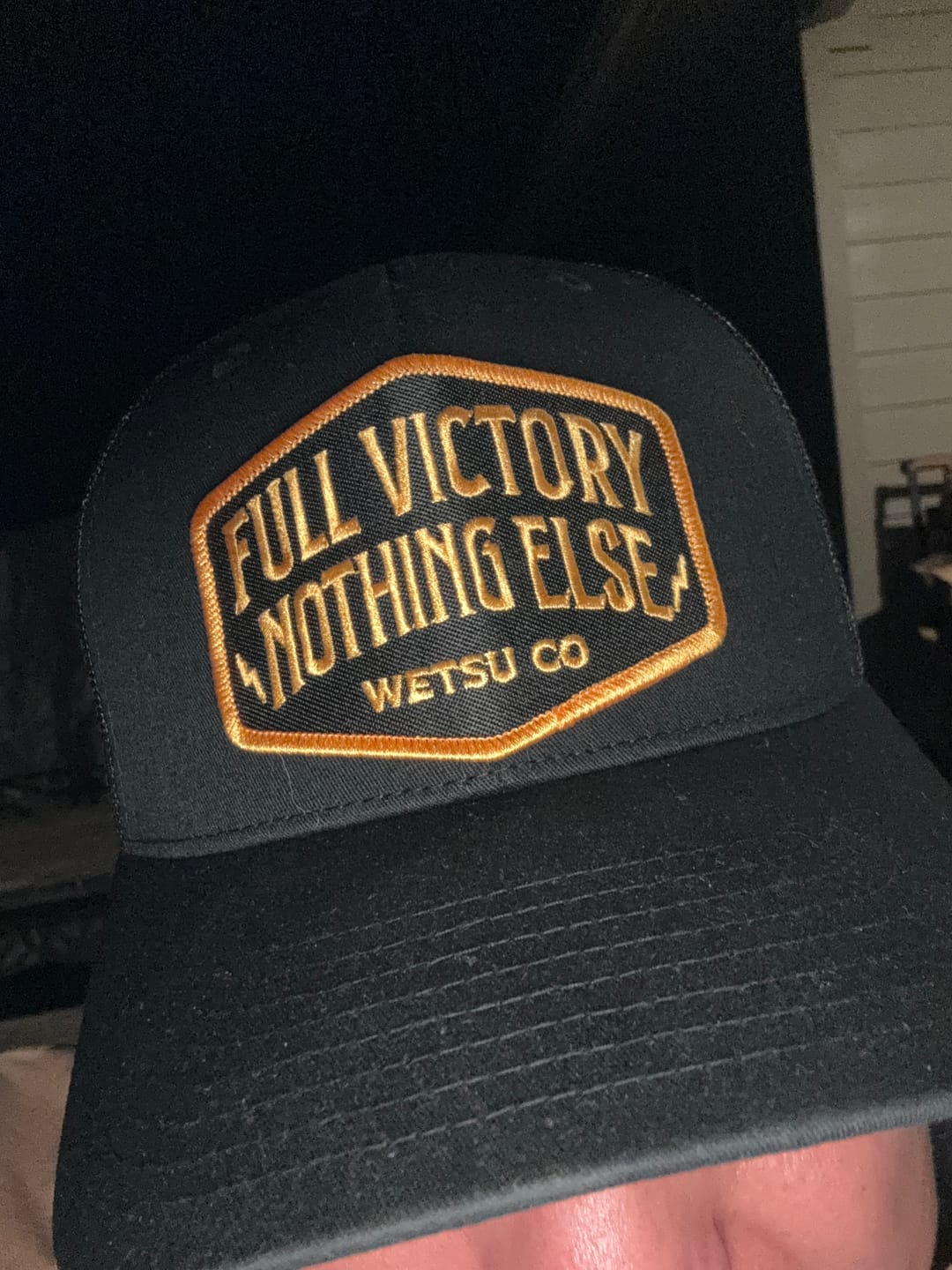 Customer photo review of Full Victory Shield Patch Trucker Hat