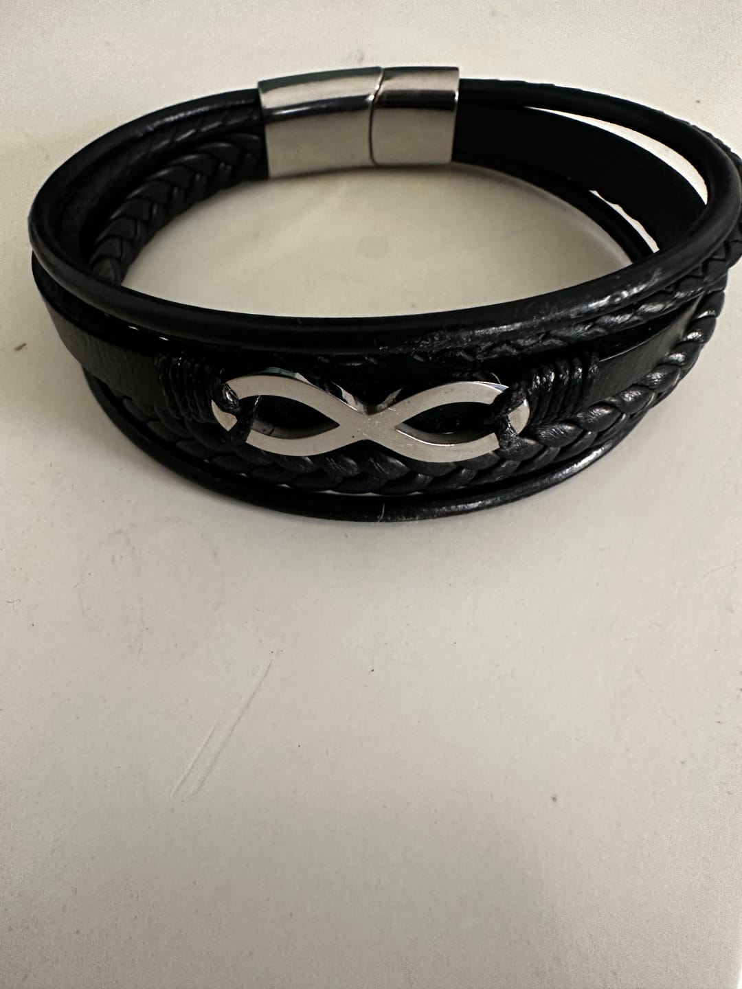 Customer photo review of Black Infinity Leather Bracelet for Men – Custom Engraved Clasp