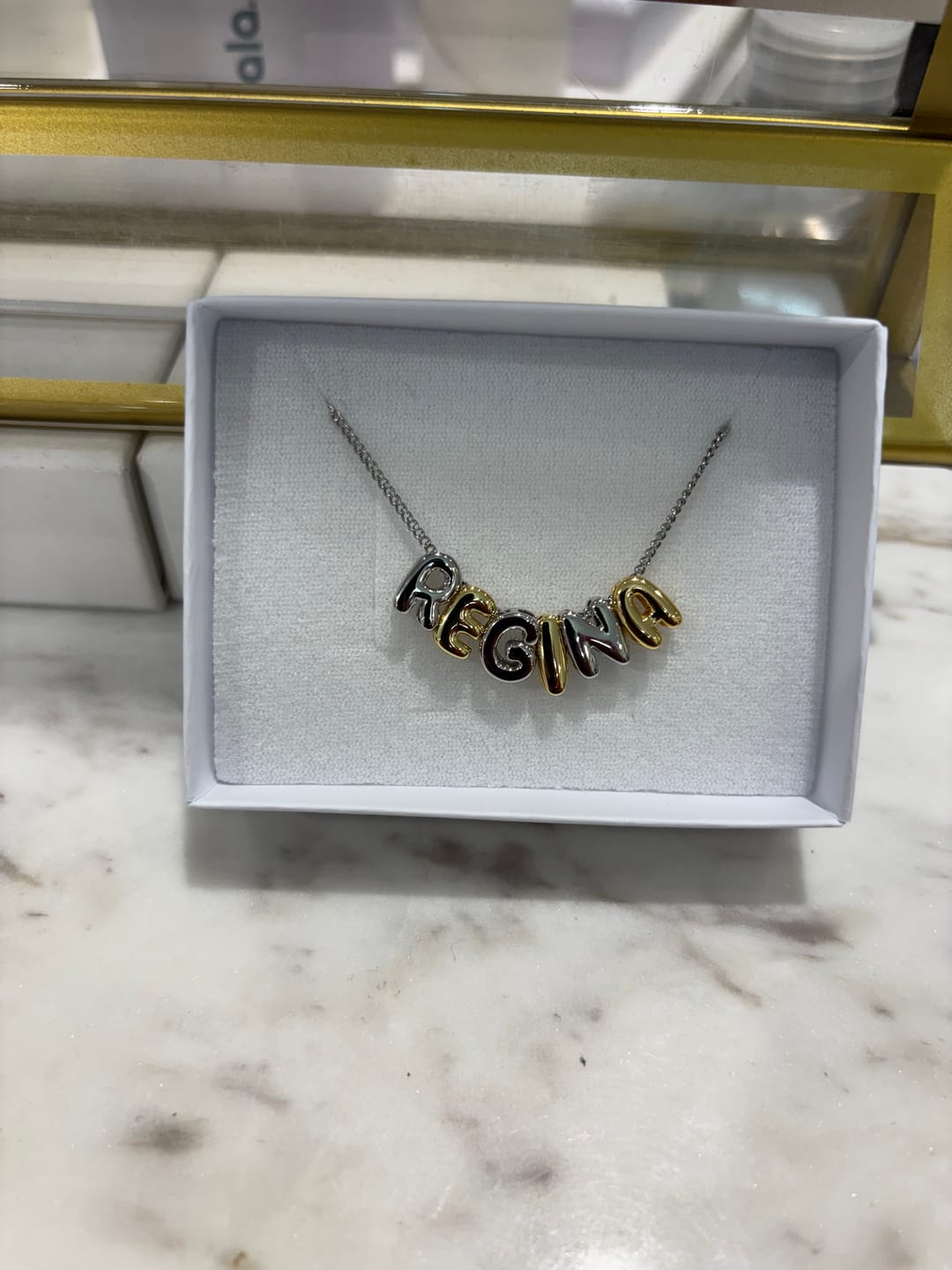 Customer photo review of Personaliza Tu Collar Con Inicial Mini Bubble Combinado