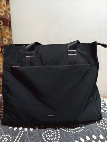 Reseña con foto de un cliente sobre Cartera De Hombro Notebook Nylon Icónica