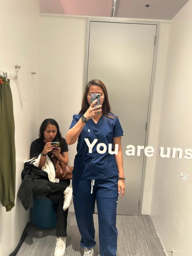 Customer photo review of 5-Pocket MoveTech® Scrub Top - Women / Navy
