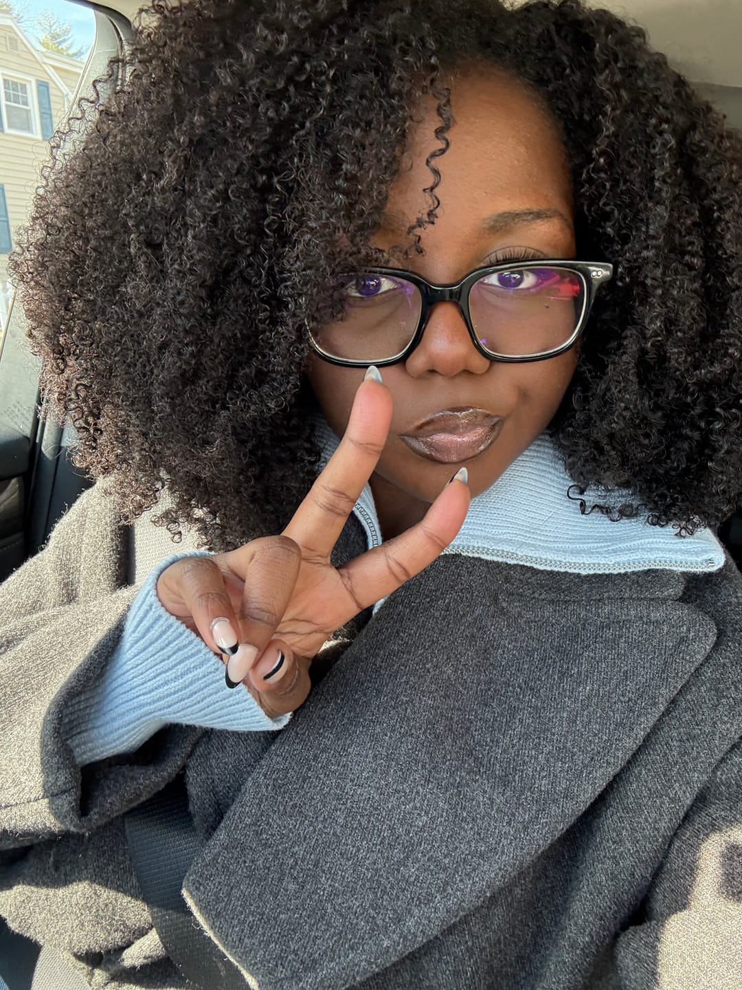 Customer photo review of Uche - Afro Kinky Curly HD Lace 5X5 Lace Closure Wig