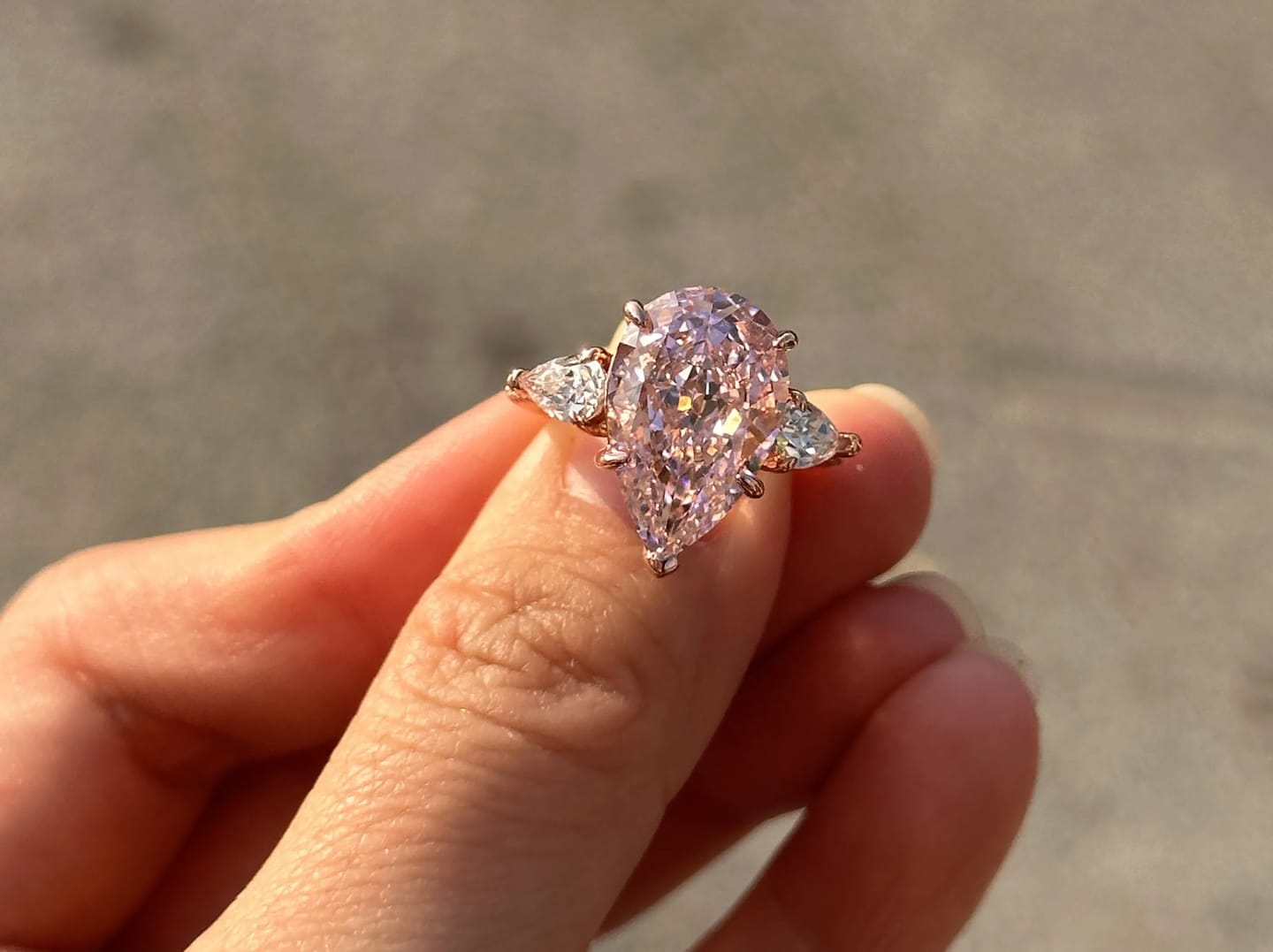 Customer photo review of Majestic Pear Cut 4.0ct Pink Stone Three Stone Engagement Ring In Sterling Silver