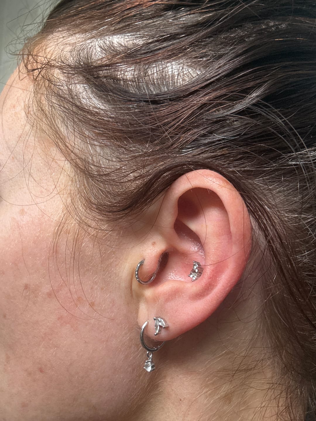 Customer photo review of Solitaire Hoop Huggie Earrings