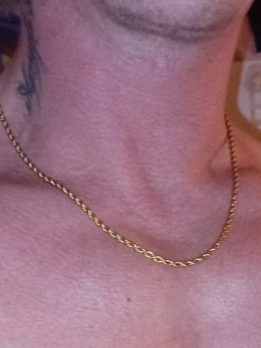 Customer photo review of Cross Pendant | Gold